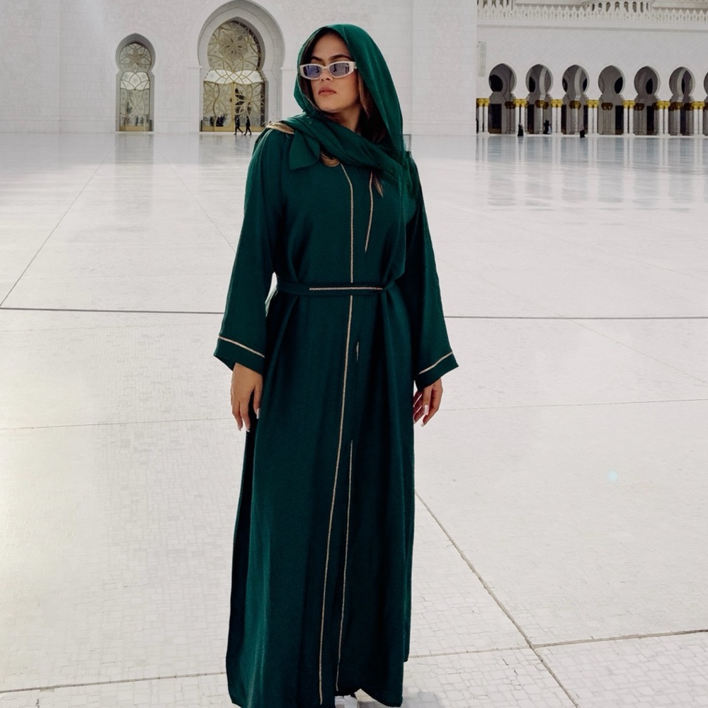 Emerald green and gold abaya- traditional Arabian/muslim attire.